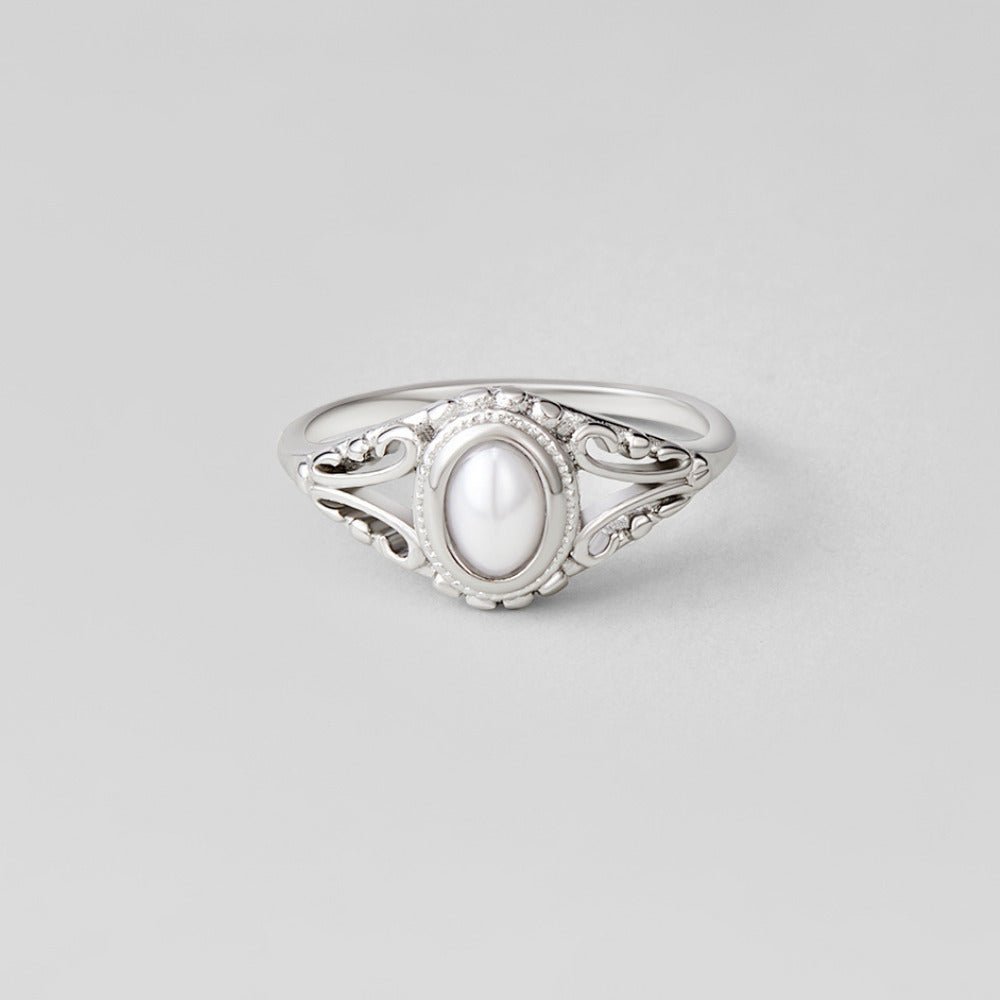 Bague argentée vintage royale perles