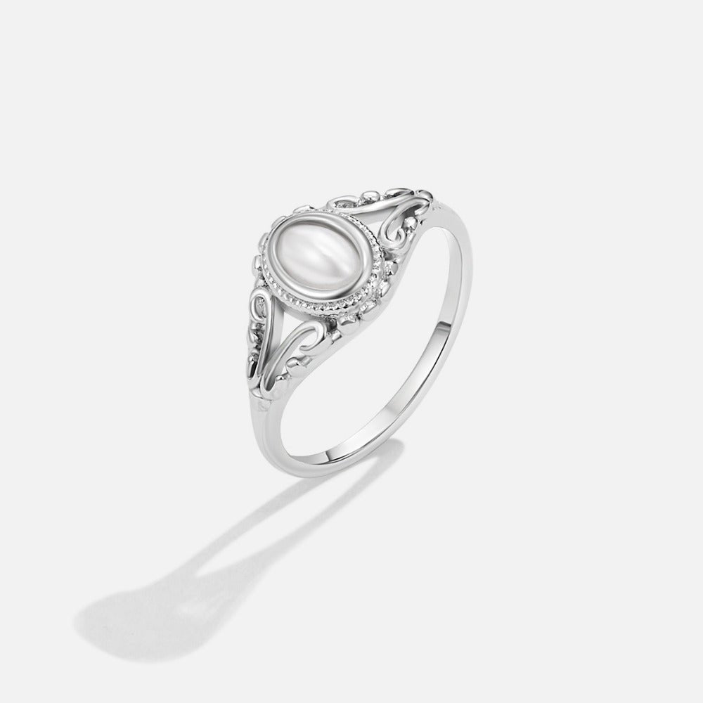 Bague argentée vintage royale perles