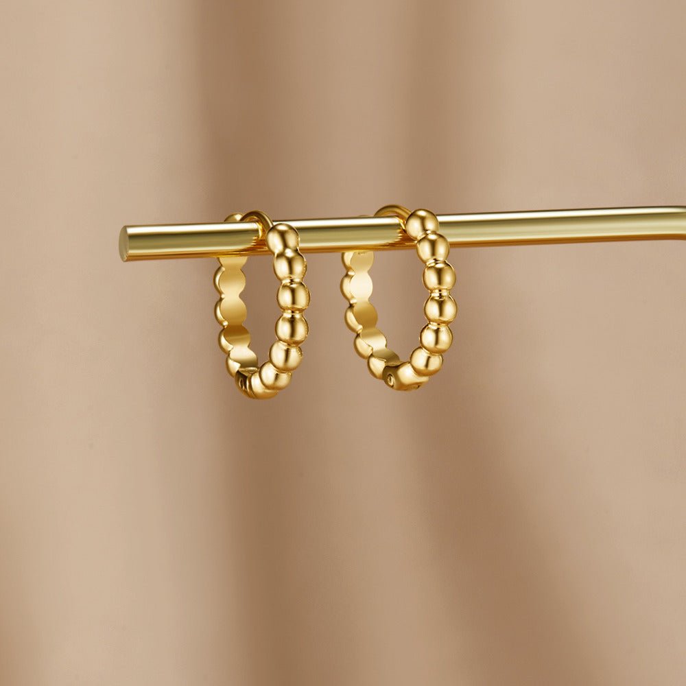 Boucles d’oreilles dorées Soraya à billes
