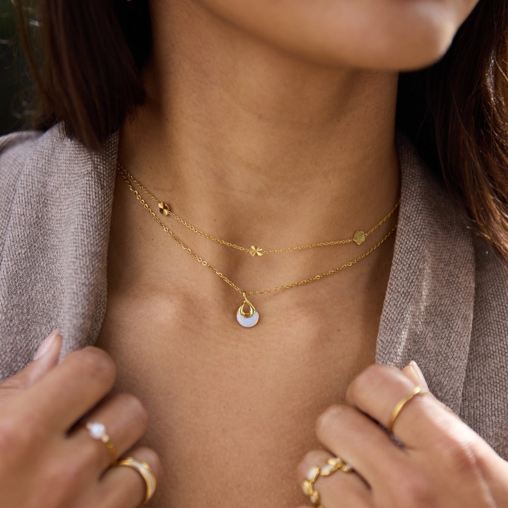Tiffany Blanc pierre pendentif collier