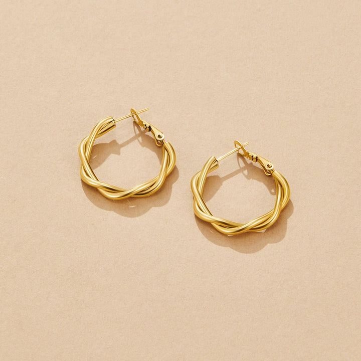 Boucles d’oreilles torsadées Celine