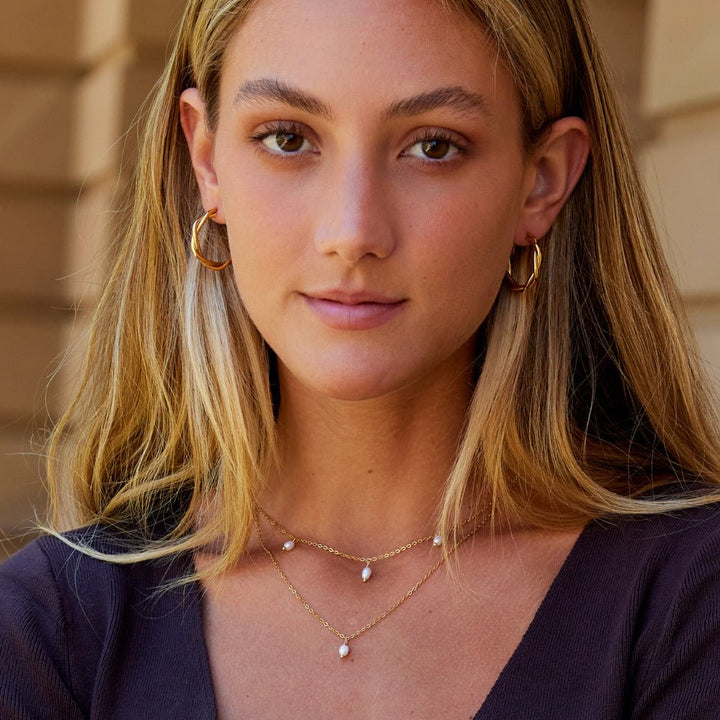Boucles d’oreilles torsadées Celine