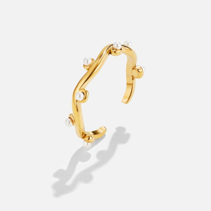 Bague ondulée perles 18K or